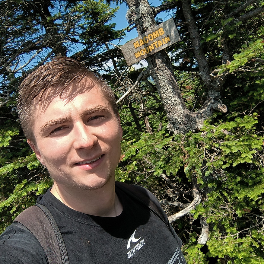 Slovakian student, Matej, hiking Macomb Mountain in the Adirondacks