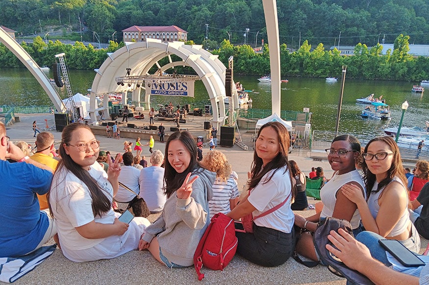 Participants enjoy live music at Haddad Riverfront Park.